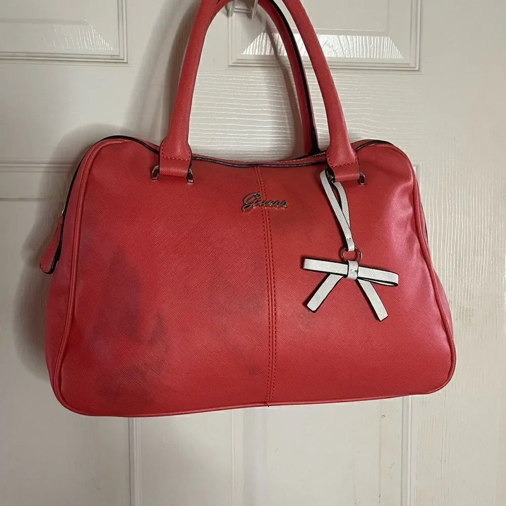Guess bright orange satchel/Shoulder bag with gold tone hardwares.